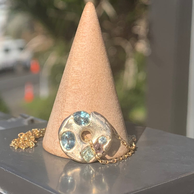 Golden Apple - Gold and sapphire donut pendant necklace