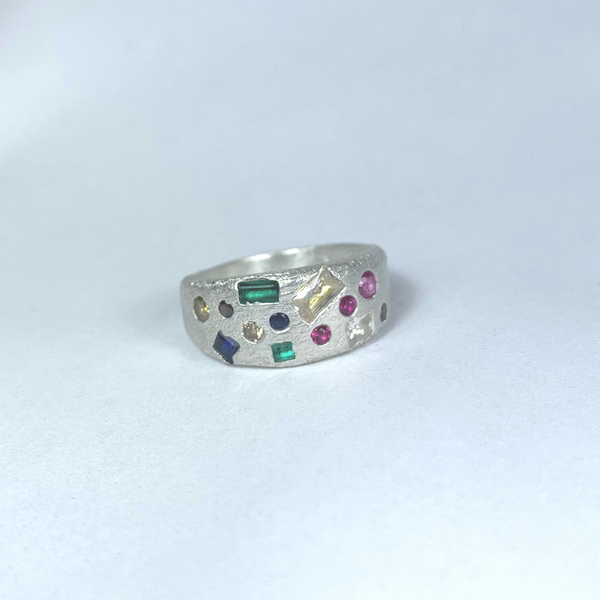 Shimmer - Silver and synthetic sapphires half-shield ring
