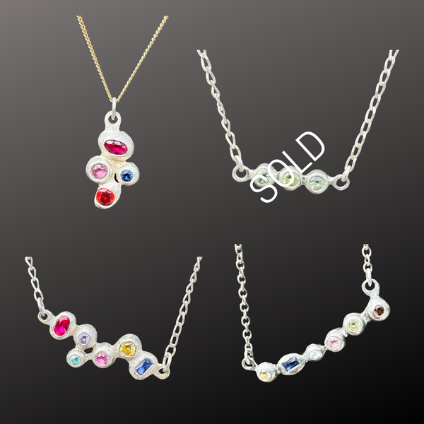 More Bubbles - Silver and sapphire pendant necklaces