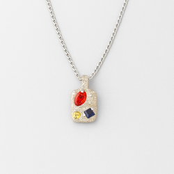 Necklace with a pendant featuring colorful gemstones on a white background
