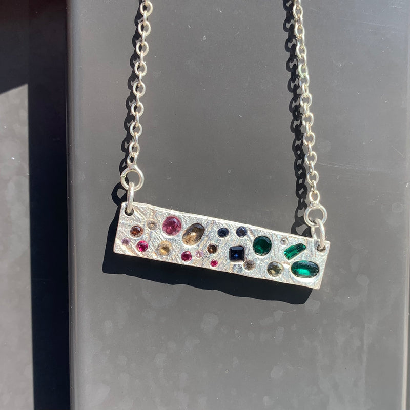 Hundreds & Thousands - Silver and synthetic emeralds and sapphire bar pendant necklace