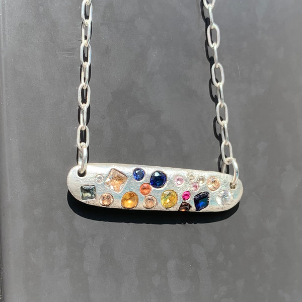 Ellipsoidal - Silver and sapphires bar pendant necklace