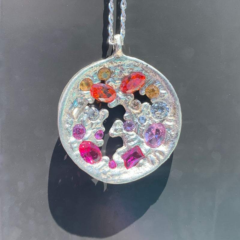 A.maze.ing - Silver and synthetic sapphire pendant necklace