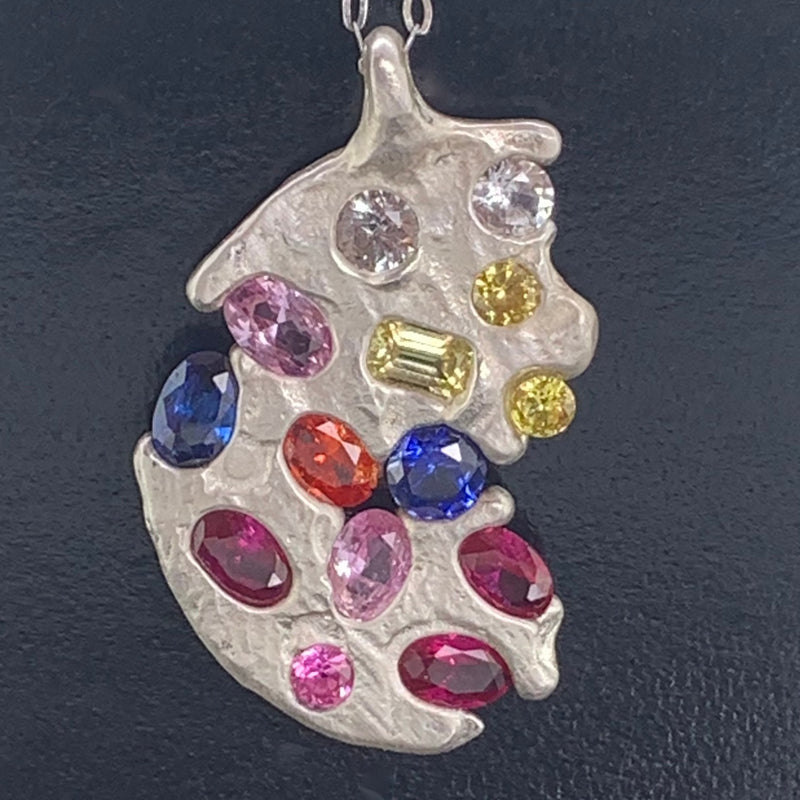 Sterling silver and synthetic sapphire pendant 