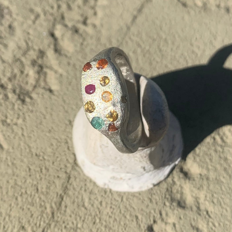 multi coloured silver ring