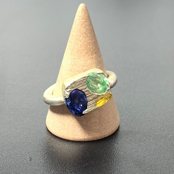 Movement - Silver and synthetic sapphire ring